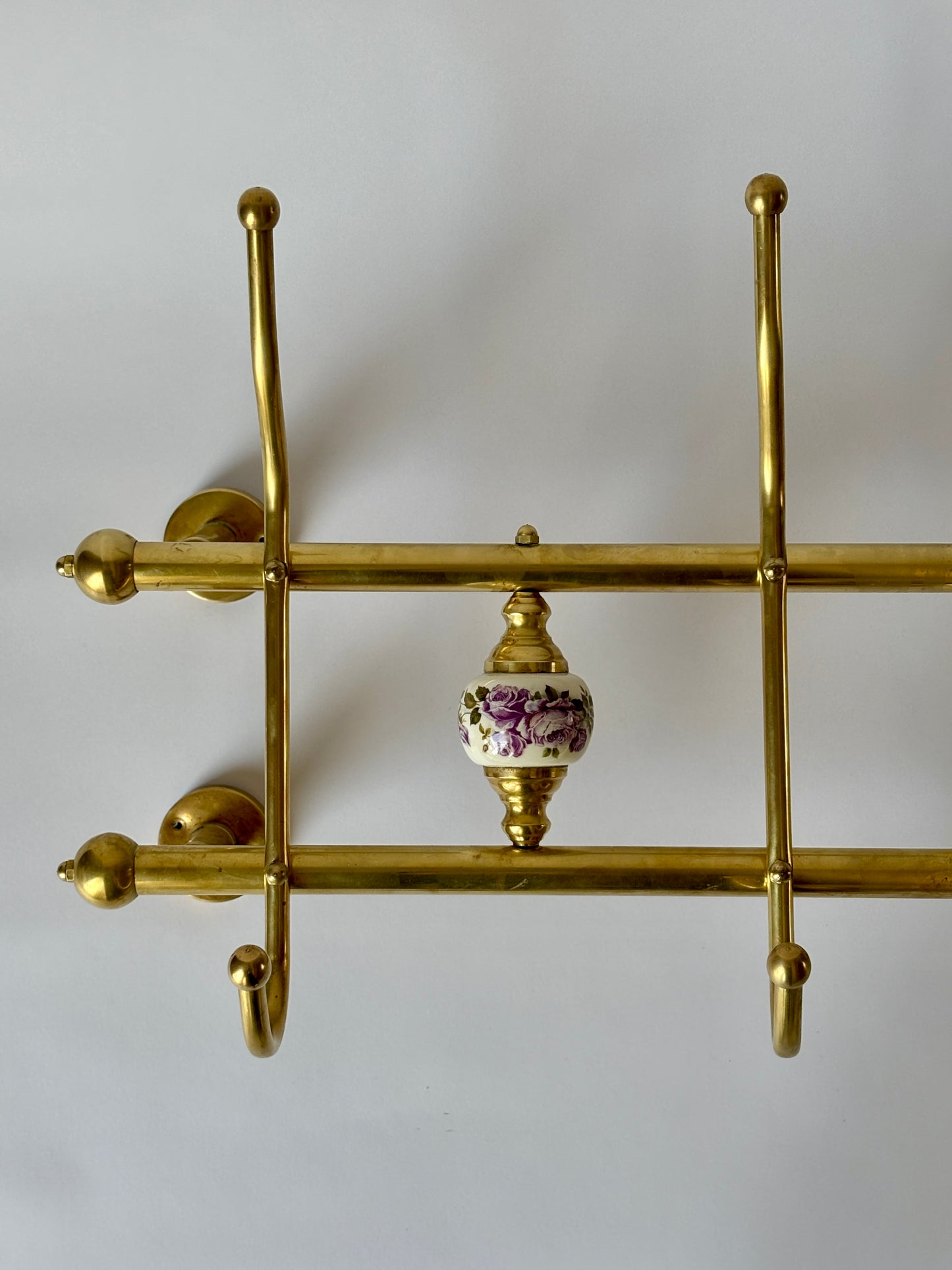 Brass and porcelain coat rack