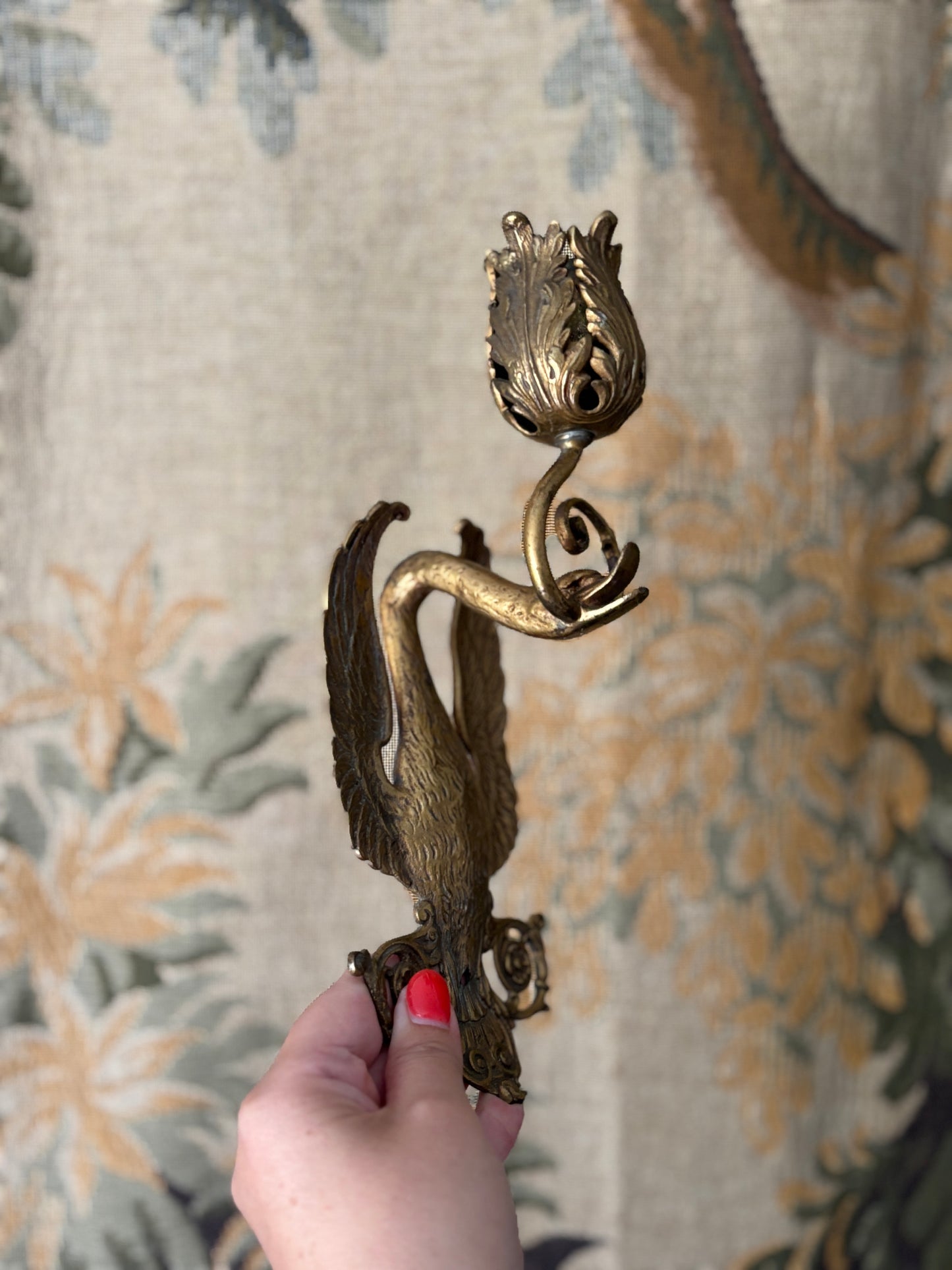 Pair of antique brass swan sconces