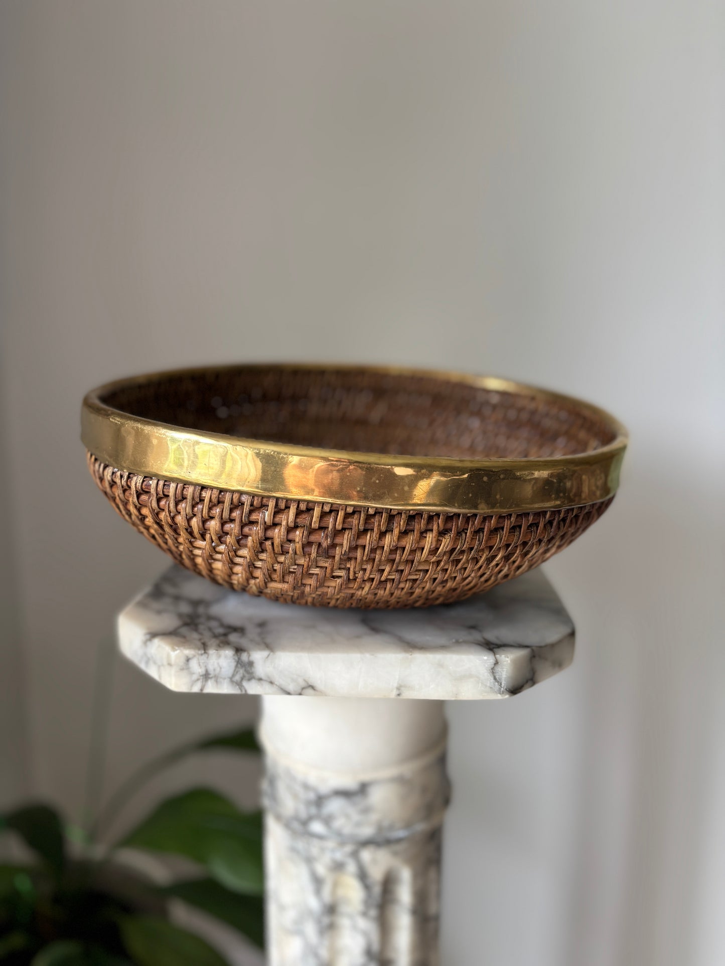 Vintage brass rimmed rattan basket