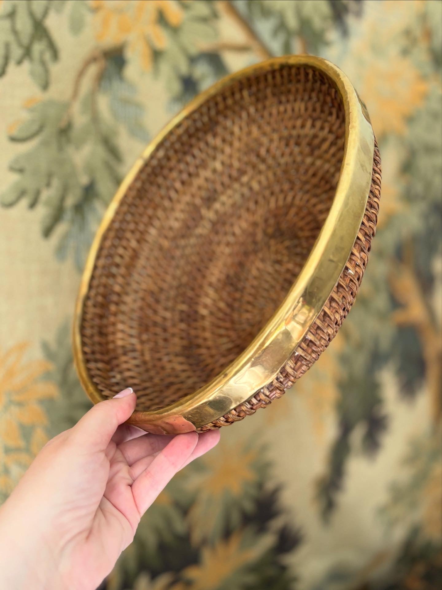 Vintage brass rimmed rattan basket