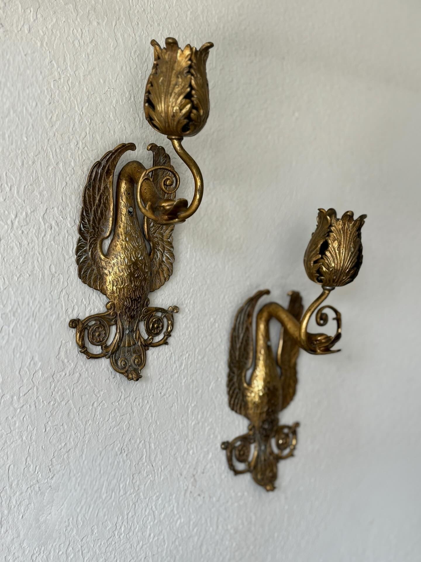 Pair of antique brass swan sconces