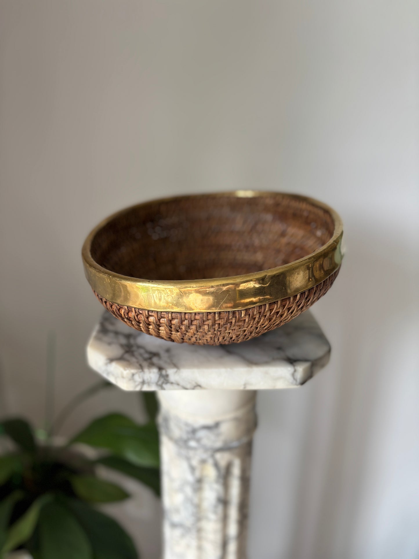 Vintage brass rimmed rattan basket